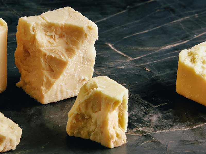 Liquid in Sharp (Aged) Cheddar Cheese Package Explained